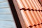 Plastic roof of a wooden house. Exhibition of Building Technologies. Close-up