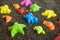 Plastic sea animals on man made sand. Children toys