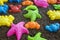 Plastic sea animals on man made sand. Children toys