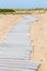 Plastic temporary wood walkway over sand on Martha`s Vineyard, Massachusetts