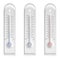Plastic thermometers on white background