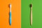 Plastic Toothbrush vs Eco-Friendly Bamboo Toothbrush. Comparison concept. No plastic, Zero Waste, Sustainable Lifestyle. Choice