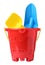 Plastic toy bucket with colorful shovels on white background