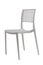 Plastic white chair with a wicker back. Patio or cafe furniture.