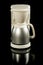 Plastic white filter coffee maker isolated on black