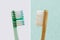 Plastic and wooden toothbrush - Concept of ecology and plastic pollution problem