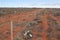 Plastic wrappings dumped at the Brand highway floating over the Western Australian outback