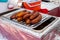 Platano frito fried bananas or platains sit ready to eat on a tray at a booth at the Canoga Park Farmer`s Market.