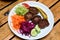 Plate of Akcaabat kofte meatballs with salad