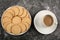 Plate of arrowroot biscuits on a rustic background.