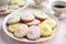 a plate of assorted easter biscuits with pastel icing