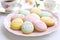 a plate of assorted easter biscuits with pastel icing