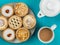 Plate of Assorted Individual Cakes or Tarts With a Pot of Tea