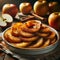 A plate attractively arranged with baked apple slices sprinkled with cinnamon and sugar