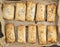 Plate with baked puff pastry pies,top view