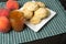 Plate of biscuits with peaches and jelly