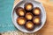 A plate of CanelÃ©s de Bordeaux