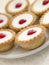 Plate of Cherry Bakewell Tarts