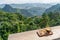 Plate of coffe and a View of Mountains from Ban Jabo Village in Northern Thailand