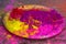 Plate with colorful dyes used for Holi festival