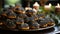 A plate of cookies with black and yellow decorations