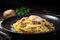 plate of creamy carbonara, with bacon and egg