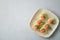 Plate of crispbreads with fresh sliced salmon fillet