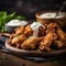 A plate of crispy chicken wings