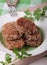 Plate of cutlets of buckwheat with onions