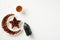 Plate of dates, Islamic lantern and cup of tea on a white background. Ramadan Kareem holiday concept