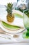 Plate decorated with a pineapple, glass and decor, green and white colour