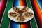 A plate of delicious carnitas tacos!