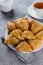 Plate with delicious samosas samsa with meat on gray background, top view. Uzbek food