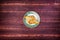 Plate with delicious samosas or samsa on wooden background. Top view
