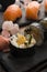 A plate of different combination of sushi with a bowl of soba