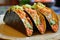 A plate displaying three tacos filled with a colorful array of fresh vegetables, creating a fusion of flavors and