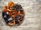 In a plate of ecologically clean dried fruits