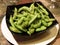 Plate of edamame at Japanese sushi restaurant