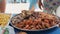 Plate of Exotic Seafood Shrimps, Squid, Octopus, Tuna Fish and fries on a Beach