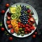 a plate filled with fruits and vegetables, including kiwis and strawberries