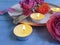 Plate, flower rose serving dining catering on a wooden background, fire candle