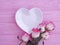 Plate flower rose  a wooden background frame  heart