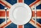Plate, fork and knife on UK flag