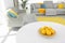 Plate with fresh lemons on table. Color ideas for interior