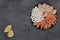 Plate of fresh mixed seafood isolated on gray background. Shrimp, squid rings, scallop