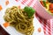 Plate of fresh spaghetti with a side salad