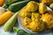 Plate with fresh squashes on table, closeup