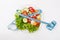 Plate with fresh vegetables salad and measured tape isolated on