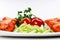 Plate with fresh vegetables, tomatos etc.