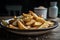 a plate of freshly made chips, with a sprinkle of salt and pepper